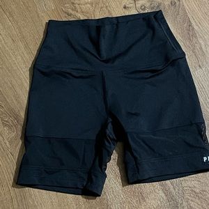 PINK shorts. Sheer around the lower thigh.